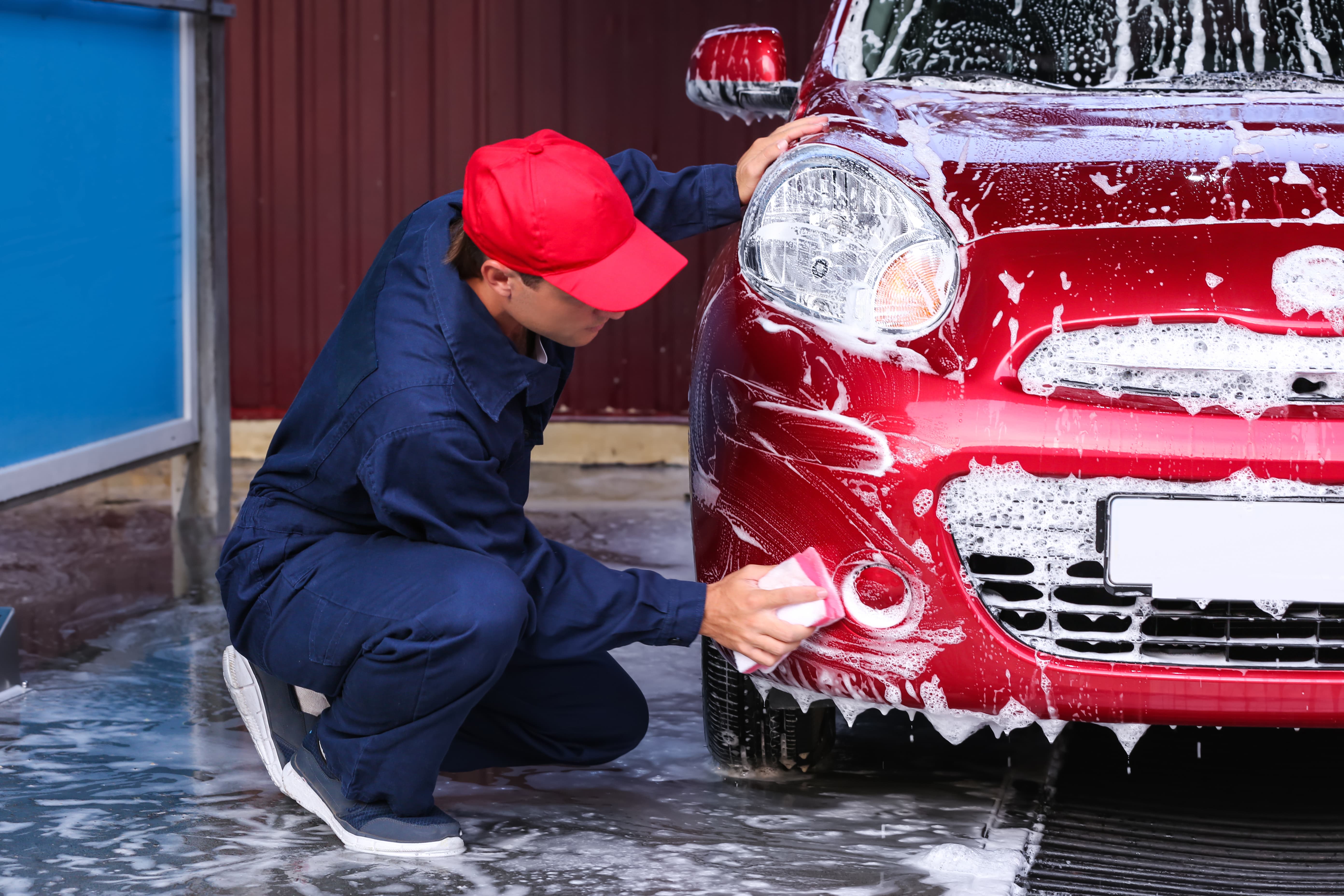 Man Cleaning Car — Car Detailing in St Beaconsfield QLD
